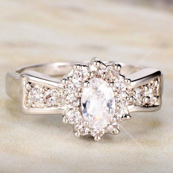 Jewelry - Women's Cubic Zirconia Oval Burst Cut Ring with Pave Accents on each side on SS